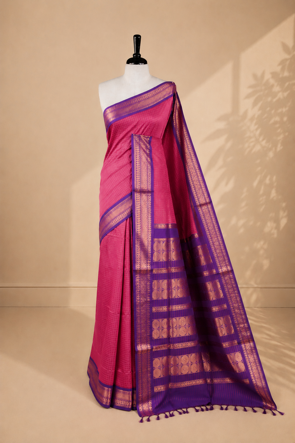 Maroon colour kalyani cotton saree featuring gold zari check pattern on body, complemented by Violet colour with Antique zari border, paired with matching blouse piece.