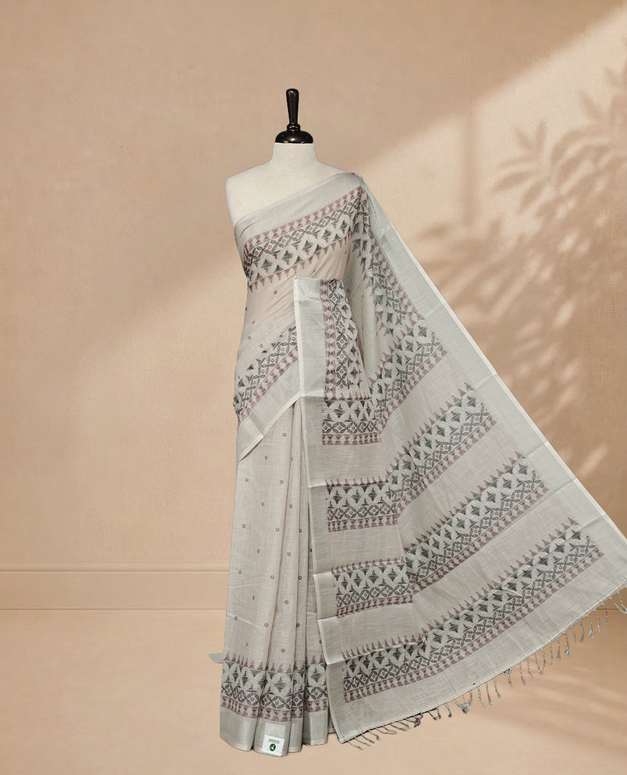Grey Colour Semi Linen colour saree featuring Thread buttas on body & border, paired with matching blouse piece thread worked border.
