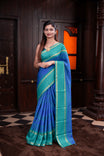 Royal Blue with Rama Colour ManiPuri silk saree featuring Kolam Design body, contrast Double Peth Border, contrast Self print blouse.