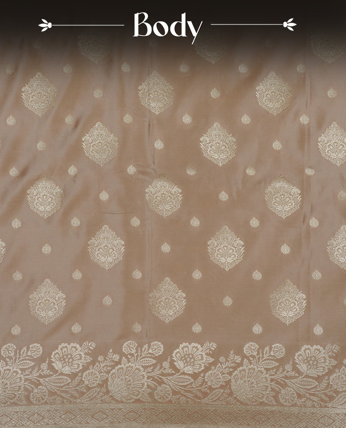 Muted Beige gold colour Mulberry silk saree featuring light gold small buttas & big motifs onbody, complemented by self colour with Light gold zari floral Border, comes with matching blouse piece.