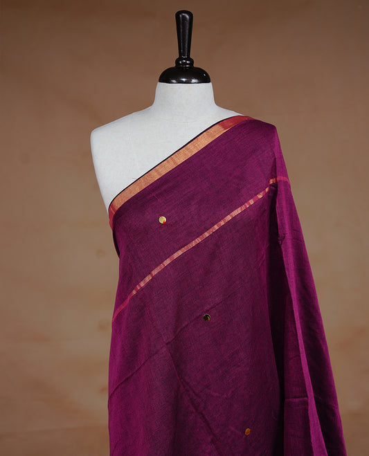 Purple colour Mul Cotton saree featuring a plain body with sequin detailing, highlighted by a small gold colour border,without blouse piece.