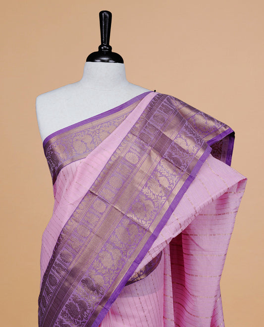 Pink colour chettinad cotton saree featuring  gold zari stripes on body, complemented by Purple border, paired with matching blouse piece.