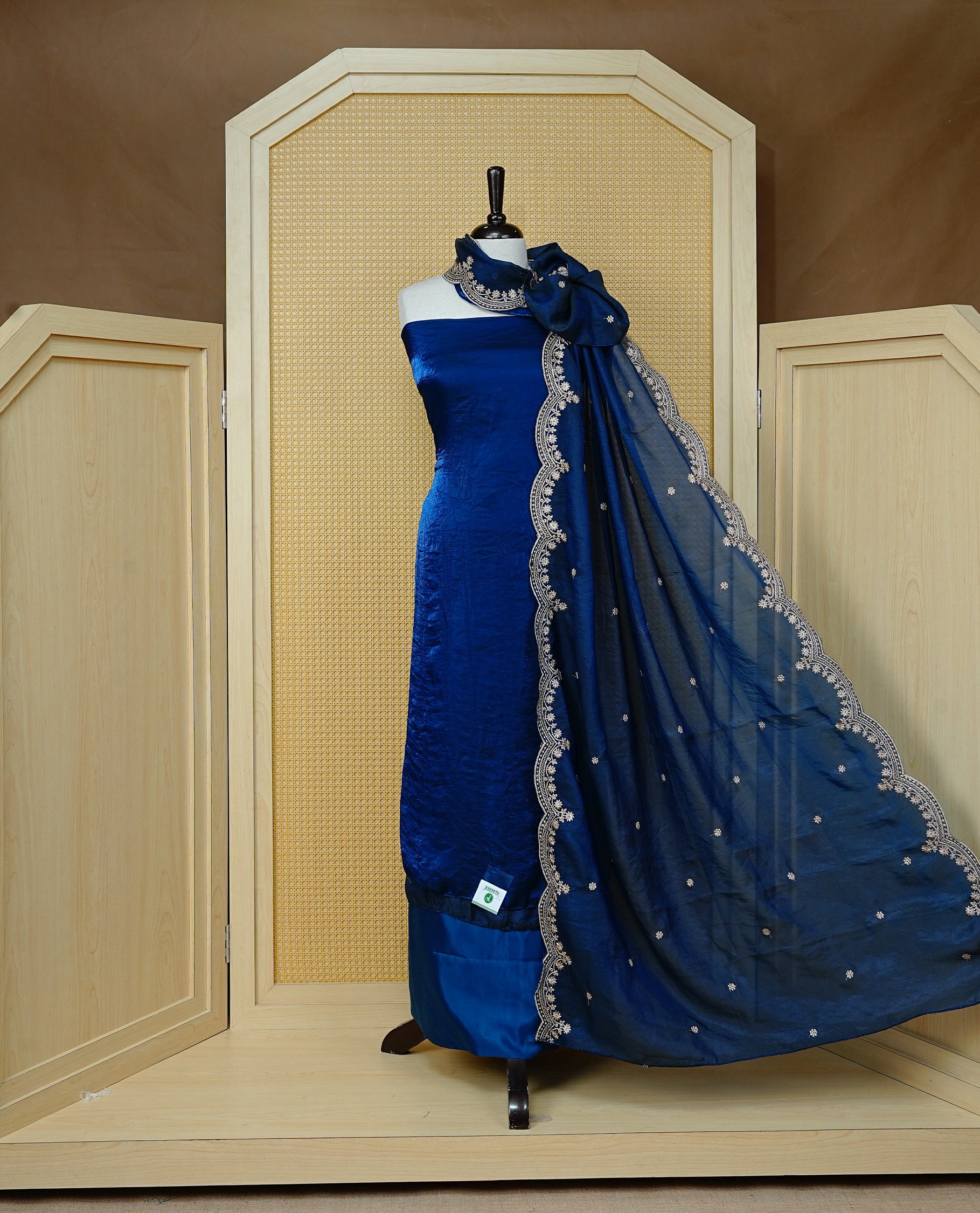 Dark Blue colour Fendy silk salwar material With Elegant plain body with lining, Comes with santoon bottom, Fendy silk dupatta With Floral buttas & Scalp Border.