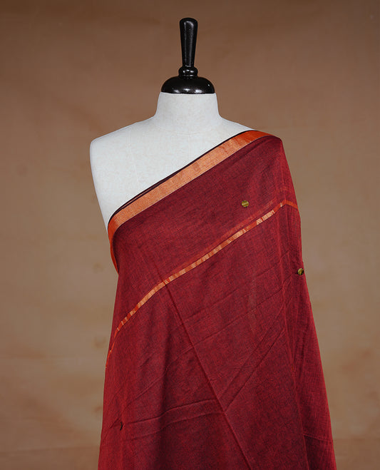 Maroon colour Mul Cotton saree featuring a plain body with sequin detailing, highlighted by a small gold colour border,without blouse piece.