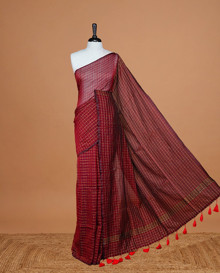 Maroon Colour Mul Cotton saree featuring Traditional Gold zari check pattern on body, Tassel finished pallu.