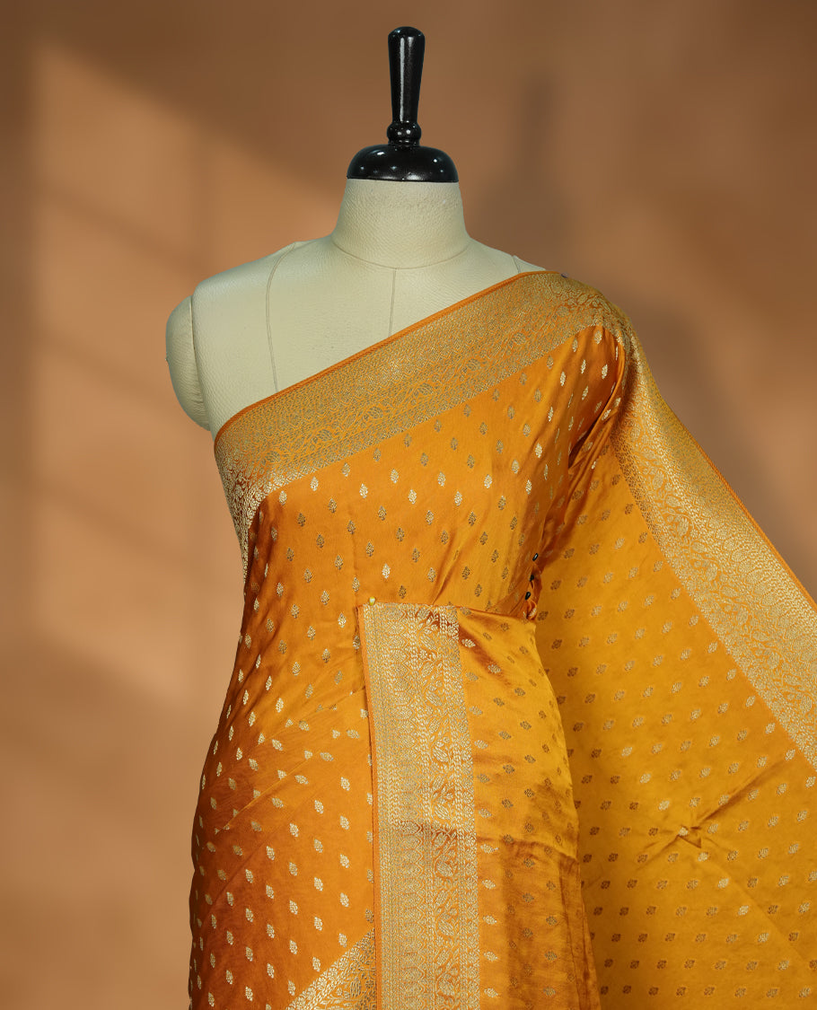 Golden Colour Semi Banarasi Satin Crepe Saree with Silver Zari Leaf Motifs, Traditional Gold Interwoven Pallu, Elaborate Woven Border, Decorative Tassels with Matching Blouse