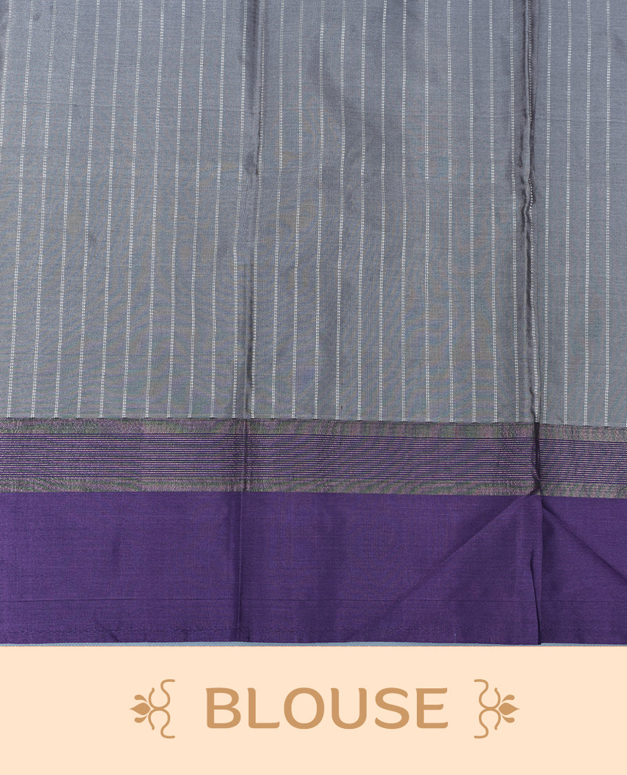 Grey colour Semi Silk Saree Featuring Gold zari Stripes on body, complemented by Contrast Border Detailing, comes with matching blouse piece.