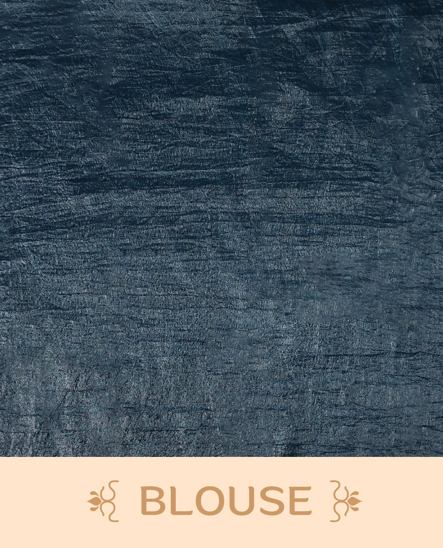 Midnight Blue Colour crush soft silk saree, textured body with a natural crinkled finish, adorned with intricate Multi colored floral Motifs and complemented by a delicate Multi Colour Bold Floral embroidery border, paired with a matching blouse