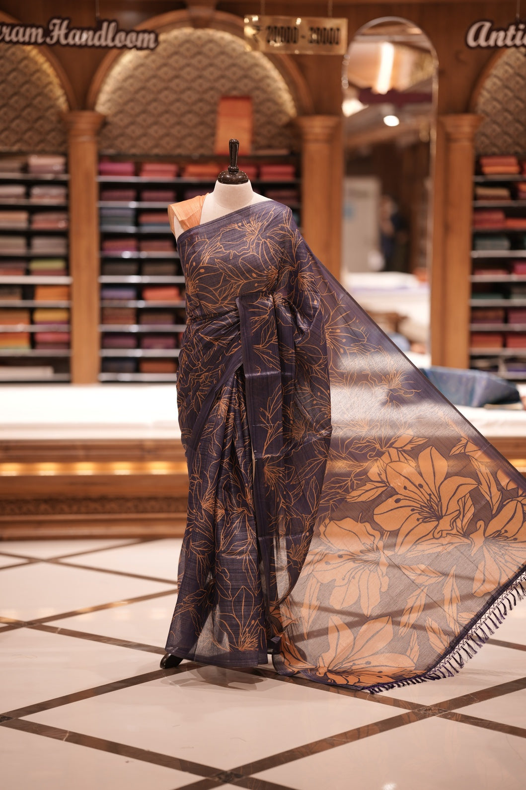 Violet & Yellow colour Semi linen tissue saree featuring full digital floral prints across the body, The saree is highlighted with a contrast floral printed pallu and comes with a plain contrasting blouse piece.