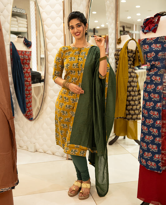 Olive Colour Cotton salwar material Featuring Contrast colour Elephant motifs on body with neat piping border, paired with matching chanderi material dupatta.