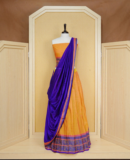 Mustard colour Dhavani set Featuring Mustard Skirt and Contrast Violet colour with Zari border, paired with UnStitched Blouse & Elegant Dupatta.